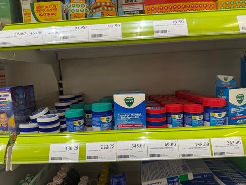 February 2025 - SM San Jose del Monte, Bulacan, Philippines:  a shelf of medicine and vicks vapor rub in the pharmacy