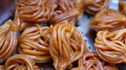 Traditional Moroccan Pastry - Chebakia or Bouchnikha on White Background | Sweet Treats | Moroccan Dessert Photography