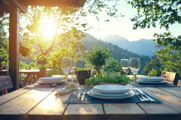 Fototapeta premium Artfully arranged plant-based dinnerware on a picnic table in warm inviting sunlight creating a cheerful vibe