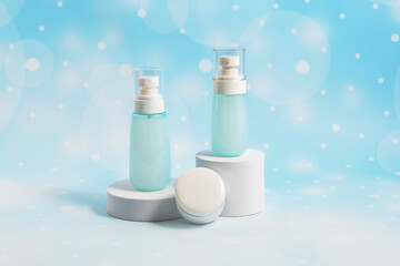 Cosmetic containers without labels are displayed on a white podium. A stage for advertising a cosmetic base.