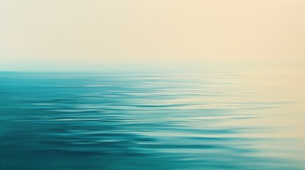 Obraz premium Ocean waves gently lapping against the shore, serene seascape with soft hues, calm water under a pastel sky, tranquil beach view with smooth surface.