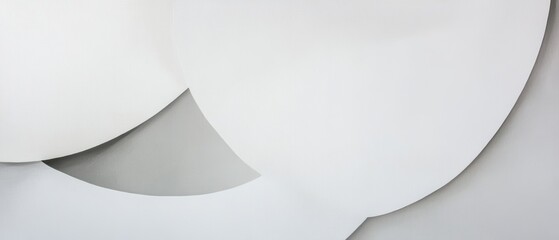 Fototapeta premium White abstract shapes on gray background, minimalist design elements, smooth curves, modern wall decor, art for contemporary interiors, clean aesthetic.