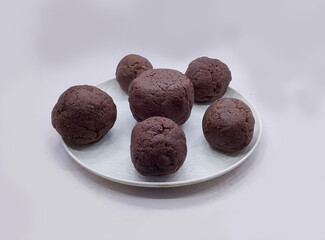 Deliciously Cooked Finger Millet Balls on a White Background. Nutritious Finger Millet Balls (Ragi Mudde) Served on a Clean White Background. Freshly Cooked Finger Millet Balls on a Minimalist White