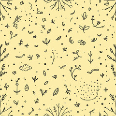 various black and white plant and leaf designs scattered across a yellow background.