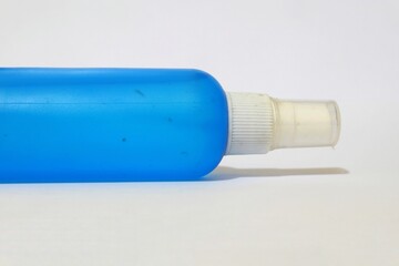 Close-up of a Used Blue Plastic Spray Bottle