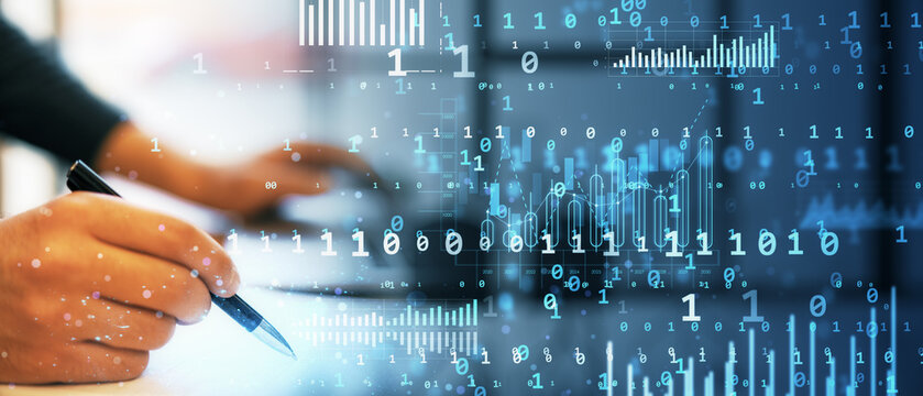 Businessman analyzing digital data on desk with futuristic virtual overlay.
