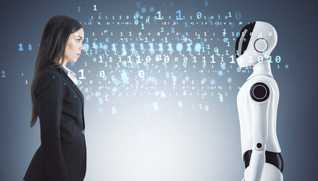 Businesswoman and humanoid robot exchanging digital data in a futuristic concept.