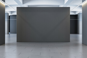 Modern gallery interior with blank dark grey exhibition walls. 3D Rendering