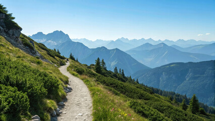 scenic hiking trail winds through lush greenery, offering breathtaking panoramic views of distant mountains and valleys under clear blue sky