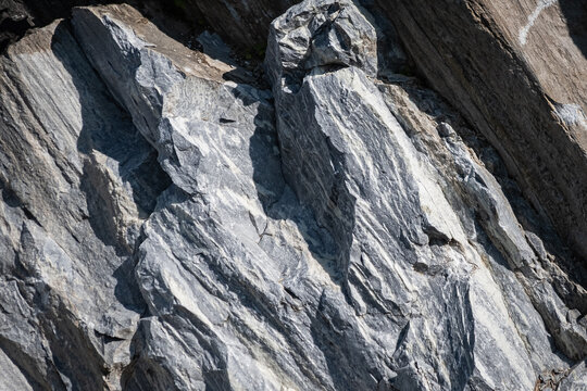 Close up of a wall of cracked rock