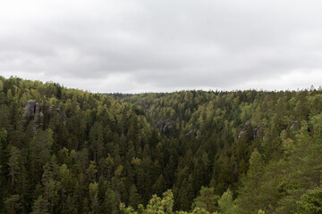 A breathtaking aerial view from the top of Adršpašské skály park, revealing the sprawling landscape below.