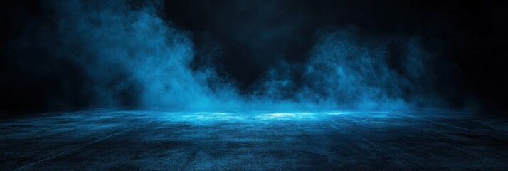 Mysterious blue fog envelops a dark stage creating an atmospheric and dramatic setting for a performance or event