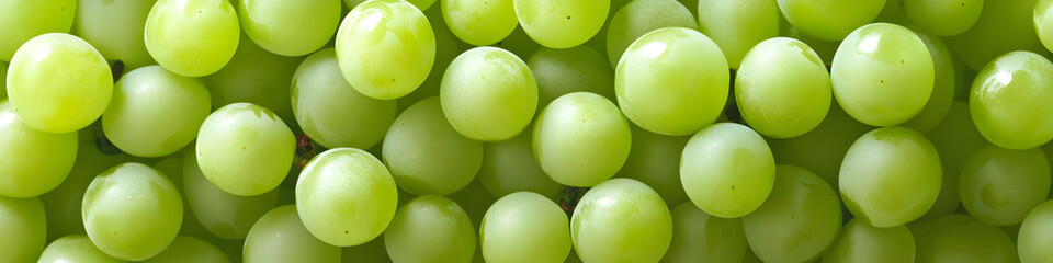 Clusters of fresh green grapes, highlighting their texture and freshness