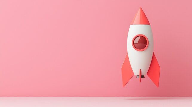 A playful rocket model stands against a pink backdrop, symbolizing creativity, imagination, and exploration.