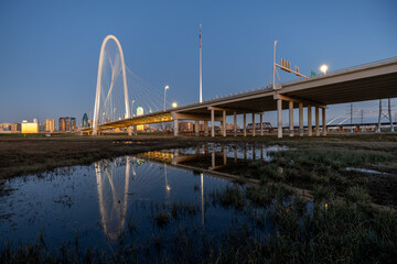 View of downtown Dallas from behind the Margaret Hunt Bridge