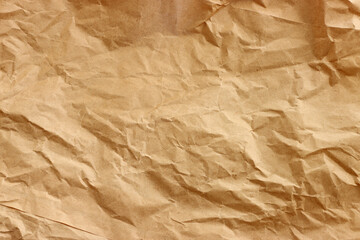 Background of crumpled brown recycled paper