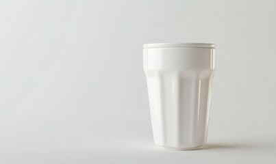White reusable coffee cup on white background, perfect for beverages