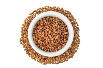 Raw buckwheat in ceramic bowl isolated on white background. Top view. Flat lay