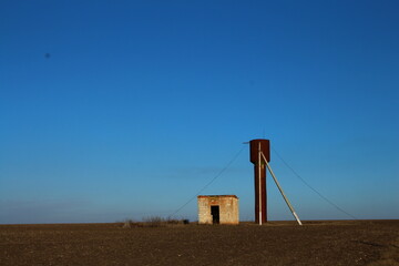 Fototapeta premium A windmill in a field