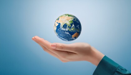 거대한 손 위에 떠 있는 작은 지구