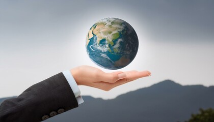 거대한 손 위에 떠 있는 작은 지구