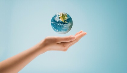 거대한 손 위에 떠 있는 작은 지구