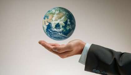거대한 손 위에 떠 있는 작은 지구