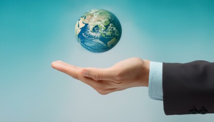 거대한 손 위에 떠 있는 작은 지구