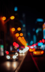 A vibrant city street at night with neon lights, traffic, and pedestrians crossing the road