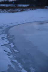 Frozen river in winter. Beautiful winter landscape. 