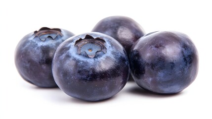 Obraz premium Fresh and Juicy Blueberries Displayed on a White Background Perfect for Healthy Eating
