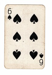 A well used and grubby spades playing card on a white background.