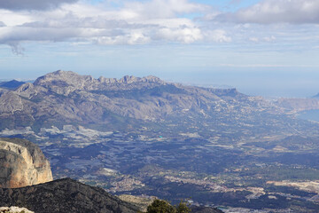 The panorama opening from the pick Puig Camapan in the direction of Benidorm and sea, Spain 