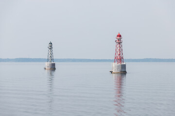 two buoys on the water, fairway, inland navigation, red and green, markings, horizon, reflections, on water, lighthouse