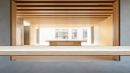 Fototapeta premium Modern office interior with a minimalist wooden table in focus, highlighting clean lines and spacious design.