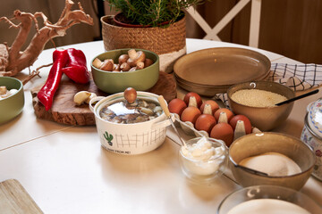 top view of the table with ingredients for cooking potatoes with mushrooms
