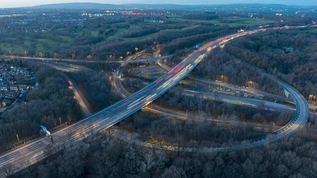 Aerial hyper lapse of the traffic on an intersection of M60 outer ring road in Swinton, Manchester - UK 