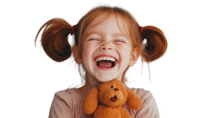 a happy red hair girl with pigtails holding a plush toy and laughing.