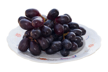 Bunch of fresh Black grapes in the white Dish with transparent background png