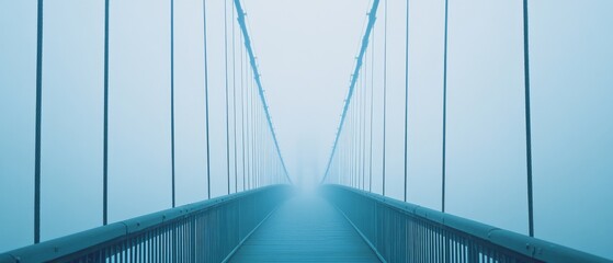 Obraz premium A bridge emerges from the fog into the unknown, symbolizing transition and the mystery of the journey ahead.