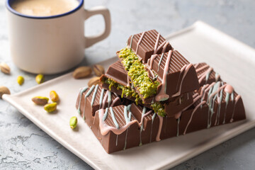 Dubai chocolate, milk chocolate filled with peanut butter and kunefe