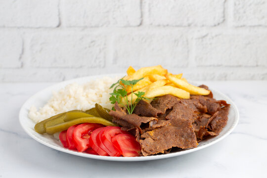 Meat doner menu, iskender menu on plate, turkish special meat doner, food, special menu (Turkish name; pilav &uuml;st&uuml; et doner)