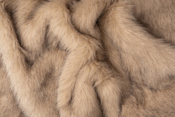 Texture of faux fur as a background, top view.