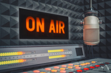 Professional microphone and sound mixer in radio station studio