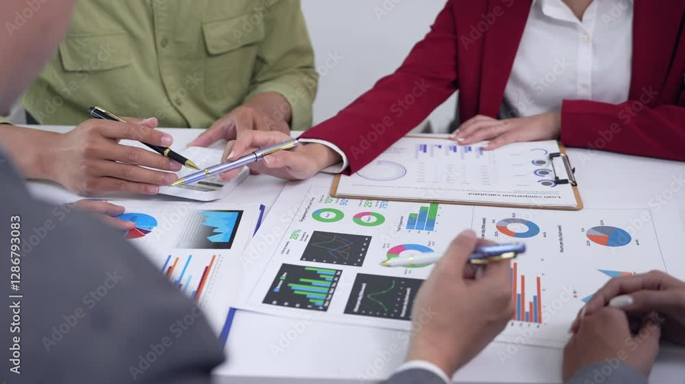 Aufkleber professional team analyzing financial data, discussing strategy with charts and graphs in modern whi