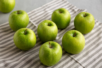 Organic Green Granny Smith Apples, side view.
