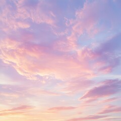 Obraz premium Pastel sunset sky with soft clouds, painted in light pinks and lavender hues.