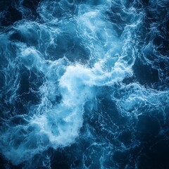 Fototapeta premium Turbulent water flows with foamy crests, showcasing the ocean's dynamic power.