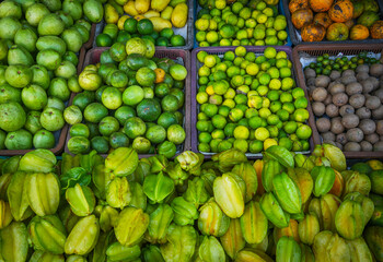 Tropical fruits background. Fresh fruits in outdoor market in Sri Lanka, Asia	