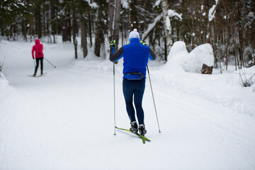Cross-country skiing.A skier goes skiing in winter on a ski run.